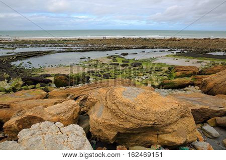 Cap Gris Nez in Cote d'Opale, Pas-de-Calais, France: View from the beach with colorful rocks