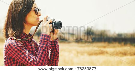 Tourist Woman Takes Photographs With Vintage Photo Camera