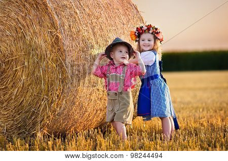 Kids Playing In Wheat Field In Germany