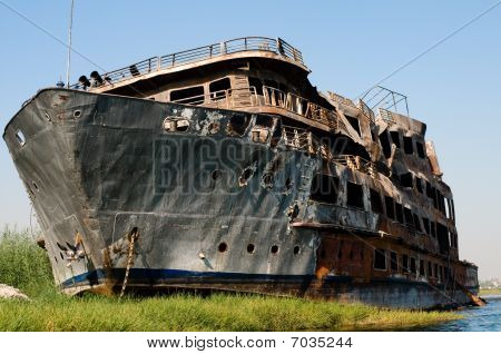 Burned Derelict Cruise Boat On The Nile.