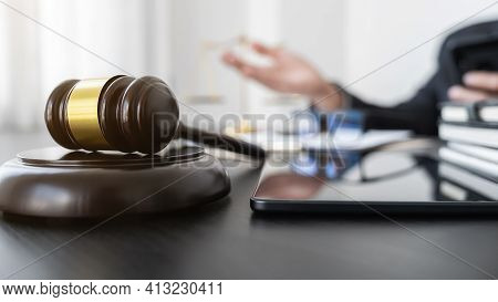 Professional Lawyer Considering With Contract Papers In Courtroom. Justice, Law, Attorney And Court 