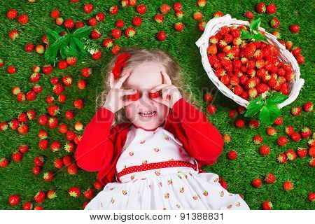 Little Girl Eating Strawberry