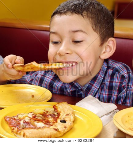 Kid and pizza