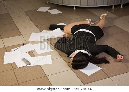 Lifeless Businesswoman In A Office