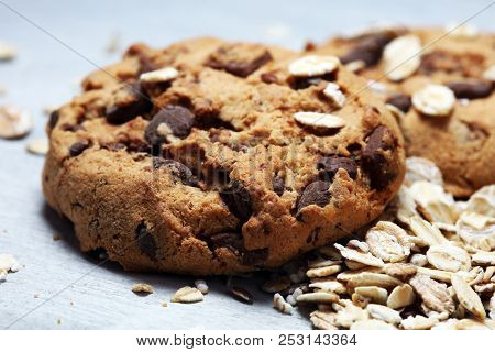 Chocolate Cookies On Rustic Table. Chocolate Chip Cookies And Cookies With Oat Flakes Or Oatmeal.