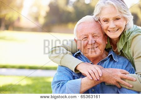 Outdoor Portrait Of Loving Senior Couple