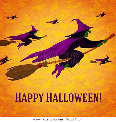 Happy halloween greeting card with horde of witches flying on the brooms.