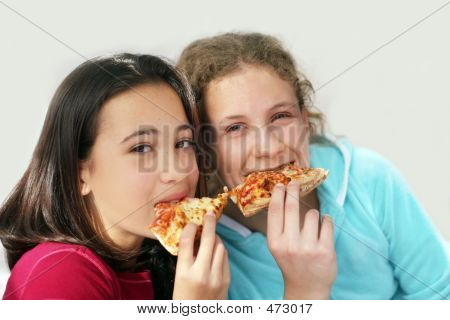 Two Girls Eating Pizza