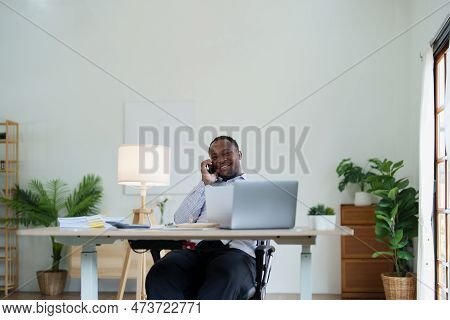 Middle Aged Man American African Using Smart Phone Mobile And Laptop Computer With Planning Working 