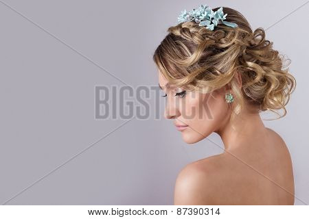 beautiful young sexy elegant sweet girl in the image of a bride with hair and flowers in her hair