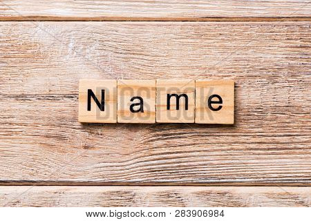 Name Word Written On Wood Block. Name Text On Wooden Table For Your Desing, Concept