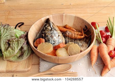 Salmon Head Cooked Of Tari Yaki Sauce With Fresh Vegetables.