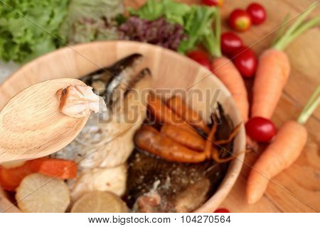 Salmon Head Cooked Of Tari Yaki Sauce With Fresh Vegetables.