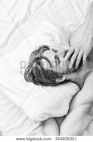 How Much Sleep You Actually Need. Bearded Man Sleeping Face Relaxing On Pillow. Man Handsome Guy Lay