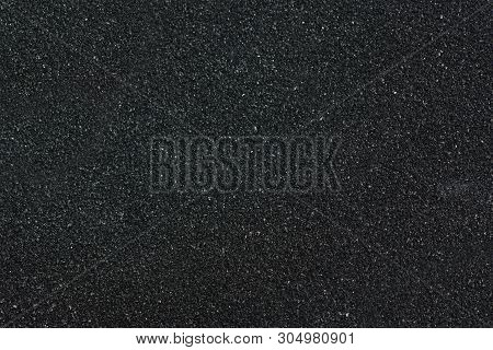 Macro Photograph Of Sandpaper Texture.black Sandpaper Texture.background Of Sandpaper. High Resoluti