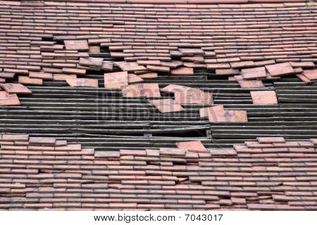 Damaged Roof With A Large Hole