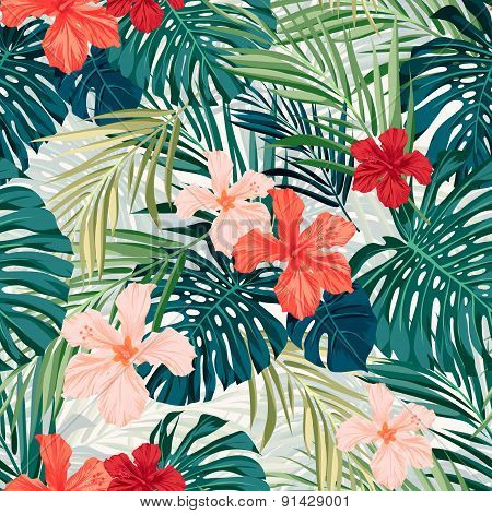 Bright colorful tropical seamless background with leaves and flowers