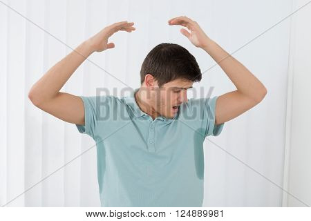 Man With Hyperhidrosis Sweating Very Badly Under Armpit