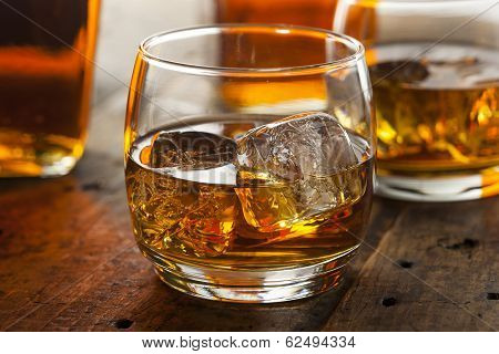 Alcoholic Whiskey Bourbon In A Glass With Ice