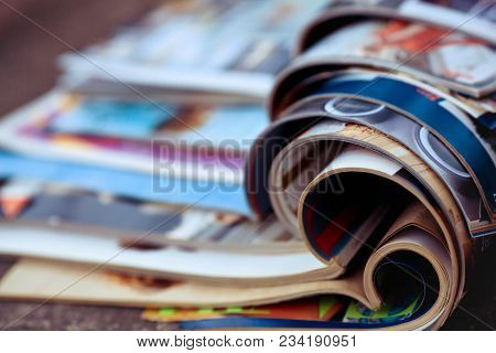 Close-up Of Stack Of Colorful Magazines. Press News And Magazines Concept