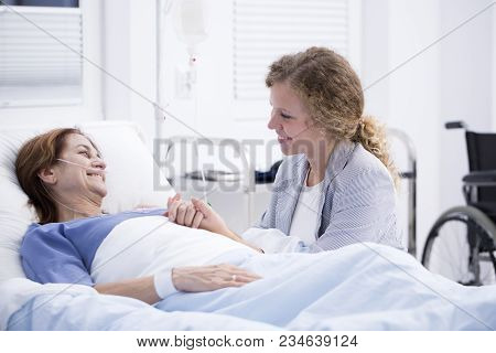 Woman Visiting Mum In Hospital