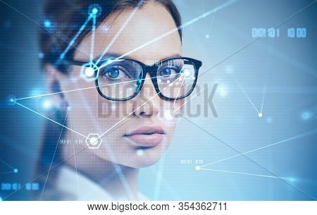 Face Of Beautiful European Woman In Glasses With Double Exposure Of Blurry Network Interface. Concep