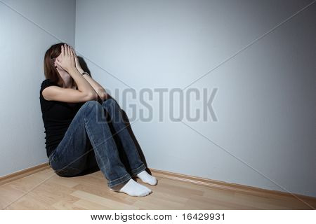 Young woman suffering from severe depression