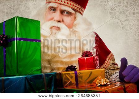 sinterklaas with gifts. Vintage Saint Nicholas in retro style with gifts. Dutch Santa Claus