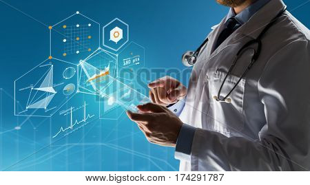 healthcare, people, technology and medicine concept - close up of male doctor in white coat with stethoscope and tablet pc computer over blue background with charts