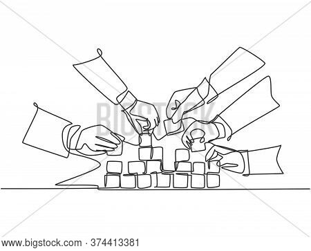 Single Continuous Line Drawing Of Business Team Member Arrange Wooden Cube Block Become Sturdy Tower