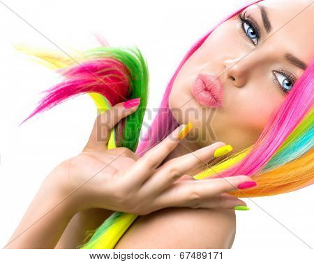 Beauty Girl Portrait with Colorful Makeup, Hair and Nail polish. Colourful Studio Shot of Woman face closeup. Vivid Colors. Manicure and Hairstyle. Rainbow Colors manicure 