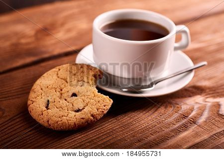 Coffee And Homemade Cookies With Chocolate. Handmade Chocolate Cookies And Cup Of Espresso On Wooden