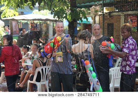 Water Fight In Songkran Festival Thai New Year On April 15, 2011 In Soi Kraisi.