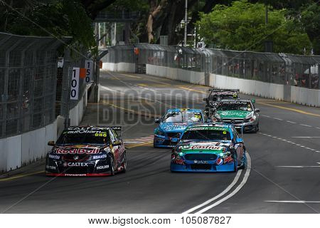 KUALA LUMPUR, MALAYSIA - AUGUST 08, 2015: Turbo charged V8 supercars take part in the V8 Supercars Street Challenge at the 2015 Kuala Lumpur City Grand Prix.