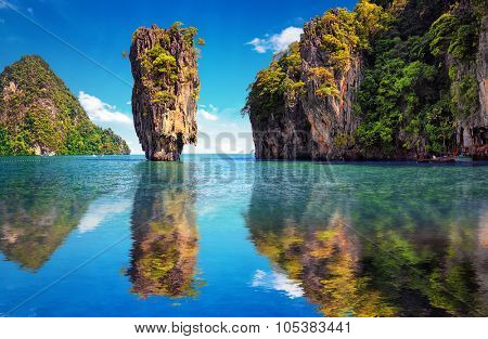 Beautiful nature of Thailand. James Bond island reflects in water near Phuket 