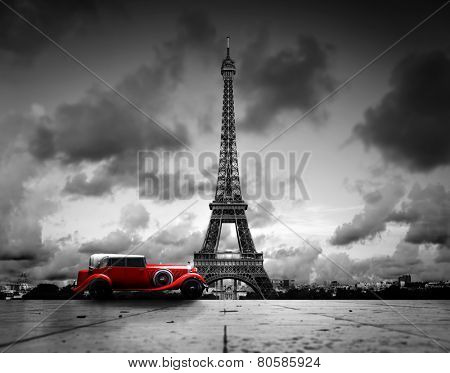 Artistic image of Effel Tower, Paris, France and red retro car. Black and white, vintage.