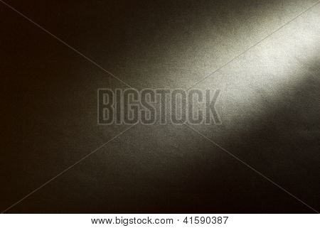 Black Background Illuminated From The Right Corner Spotlight