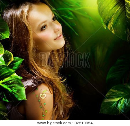 Beautiful Girl in Green Mystical Forest