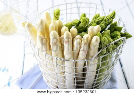 White and Green Asparagus in Basket