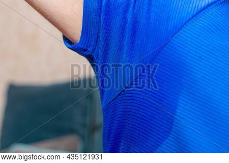 Man With Hyperhidrosis Sweating Very Badly Under Armpit.man Sweating Excessively Smelling Bad At Hom