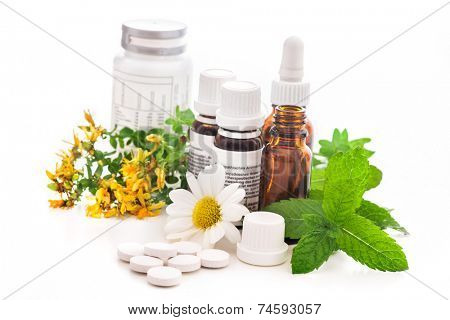 Healing herbs and medicinal bottles. Alternative medicine concept