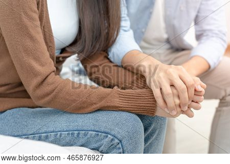 Couple Hold Hand Support Each While Discussing Family Issues With Psychiatrist. Husband Encourages W