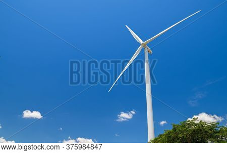 Big Windmills For Electric Power Production On Blue Sky At Huai Bong, Dan Khun Thot District, Nakhon