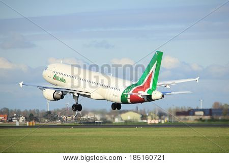 Amsterdam the Netherlands - April 7th 2017: EI-DSL Alitalia Airbus A320 takeoff from Polderbaan runway Amsterdam Airport Schiphol