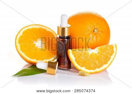 Orange Essential Oil Isolated On White Background. Orange Oil For Skin Care, Spa, Wellness, Massage,