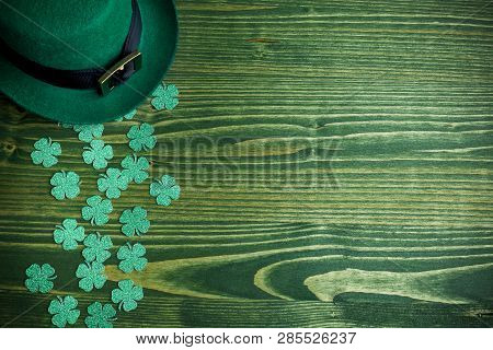 Lucky Green Hat For St. Patricks Day On Green Wood Background