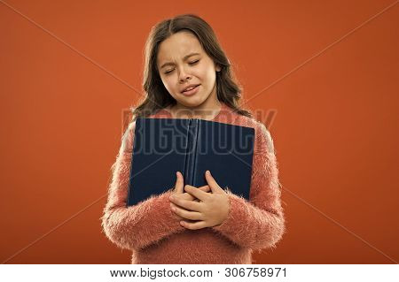 Sad Ending Story. Girl Hold Book Read Story Over Orange Background. Child Enjoy Reading Book. Book S