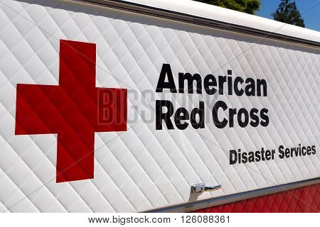 ARCADIA CA/USA - APRIL 16 2016: American Red Cross Disaster Services vehicle and logo. The American National Red Cross is a humanitarian organization that provides emergency assistance in the United States.