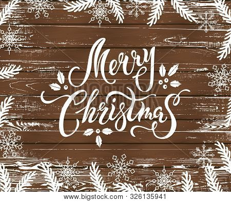 Merry Christmas And Happy New Year Card On Wood Textured Background. Place For Text. Hand Drawn Lett