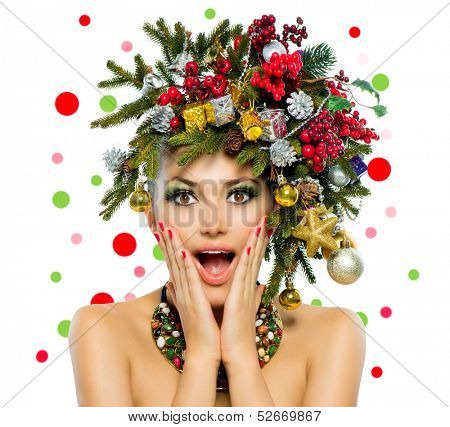 Christmas Woman. Beautiful New Year and Christmas Tree Holiday Hairstyle and Make up. Beauty Girl Portrait. Colorful Makeup, Hair, Nail polish and Accessories. Surprised Woman. Open Mouth, Emotions 